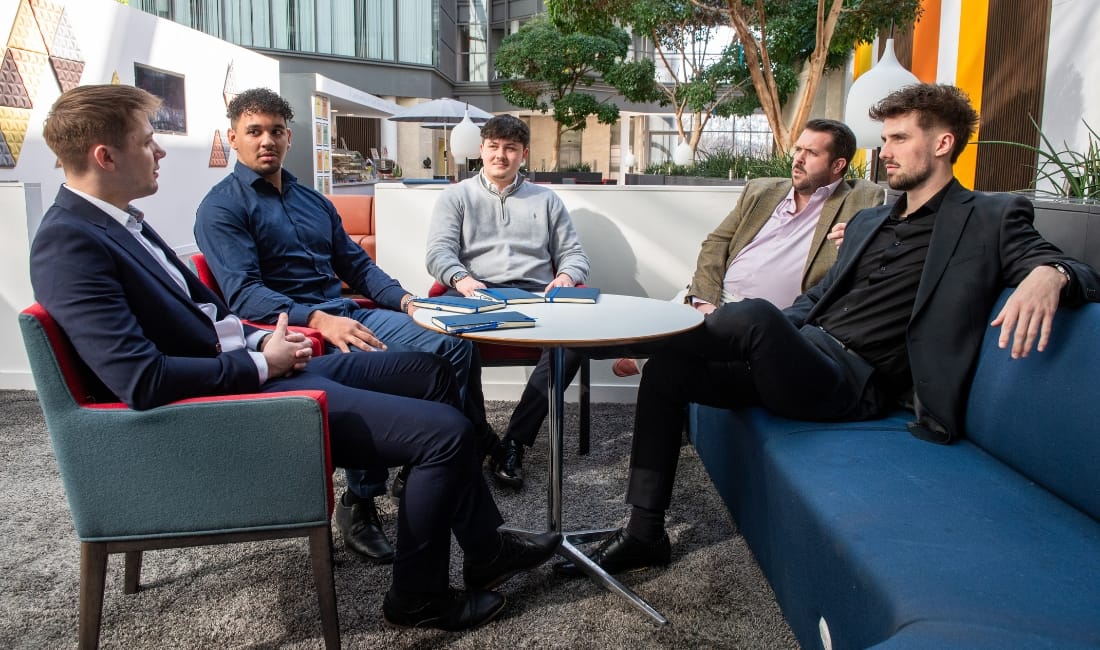 Bluestar's new sales team sitting around a table