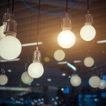 LED lights hanging from the ceiling in a cafe