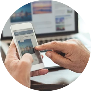 man tapping on phone to navigate through website